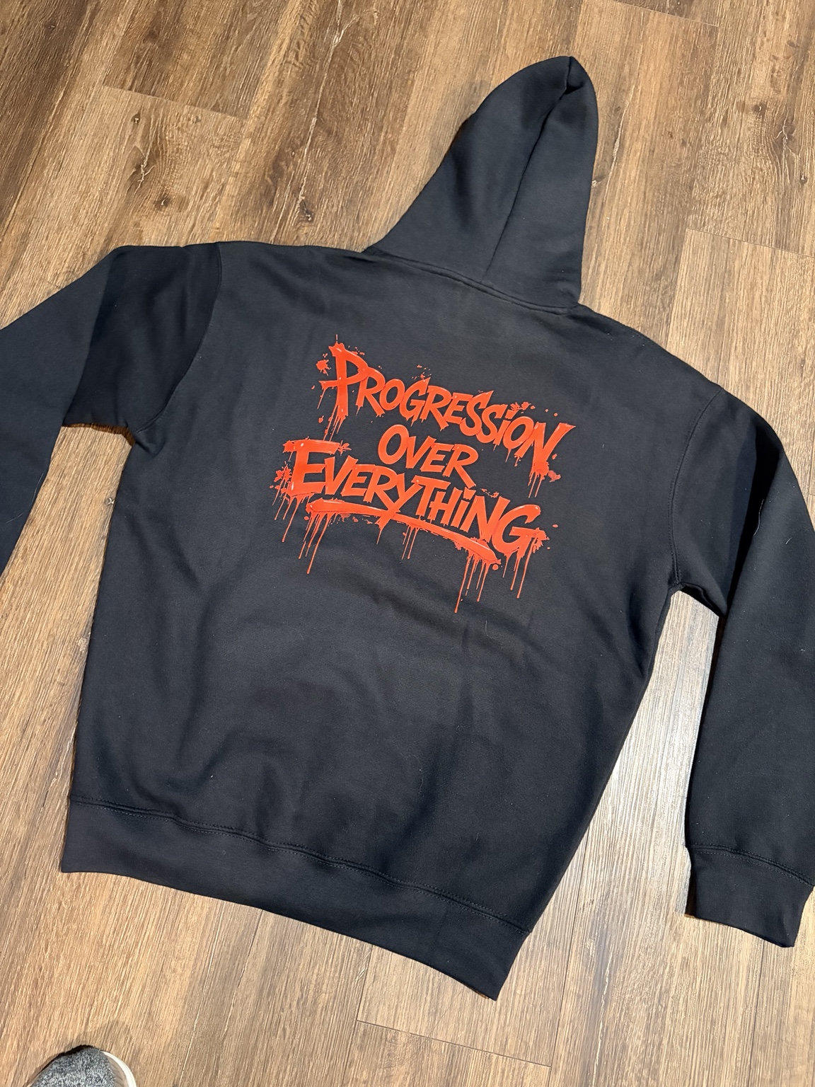 Progression Over Everything hoodie — Back view